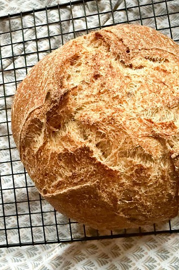 Freshly baked bread with a rustic crust, perfect for healthy homemade recipes.