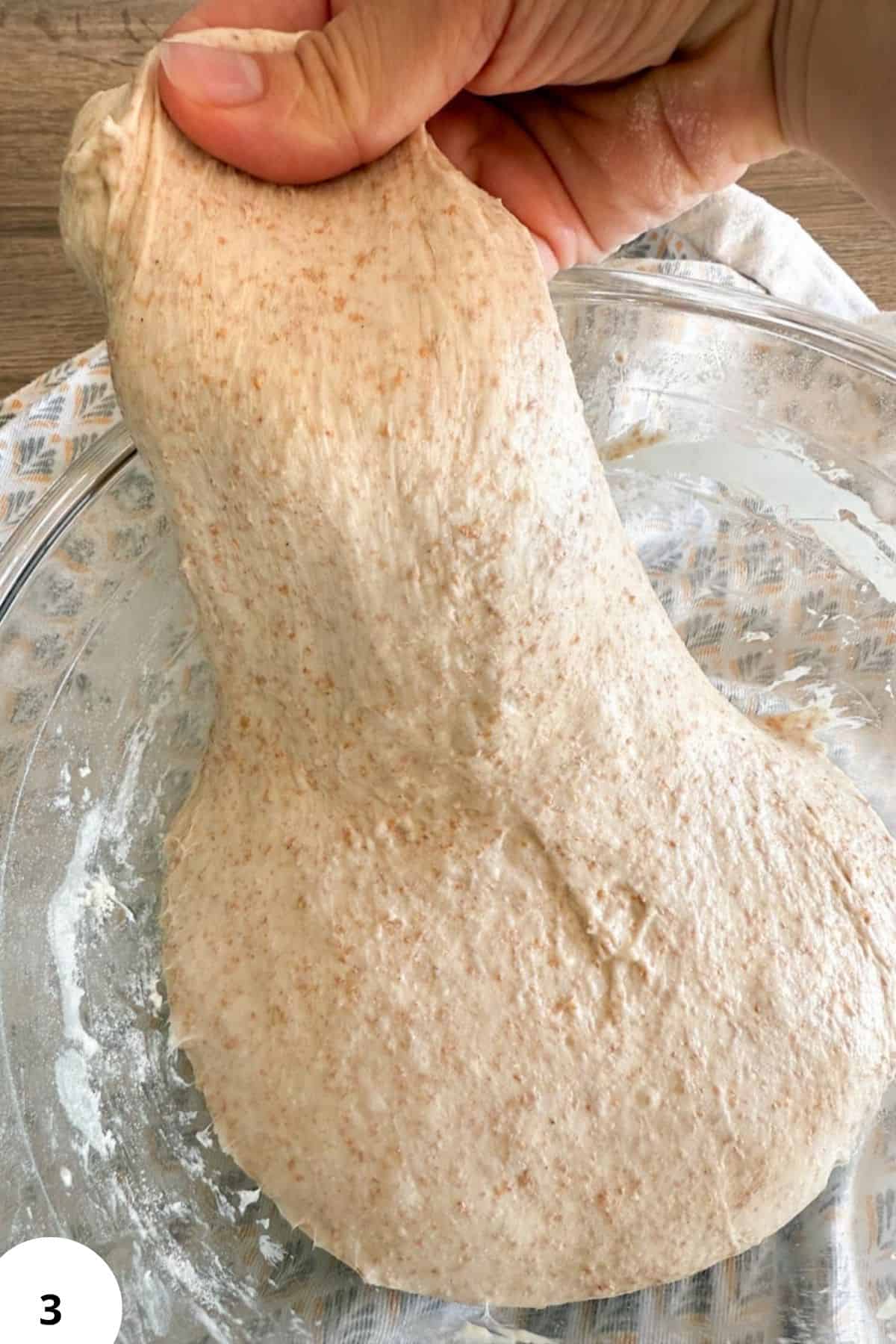 Freshly milled whole grain bread dough prepared for baking with wholesome grains.