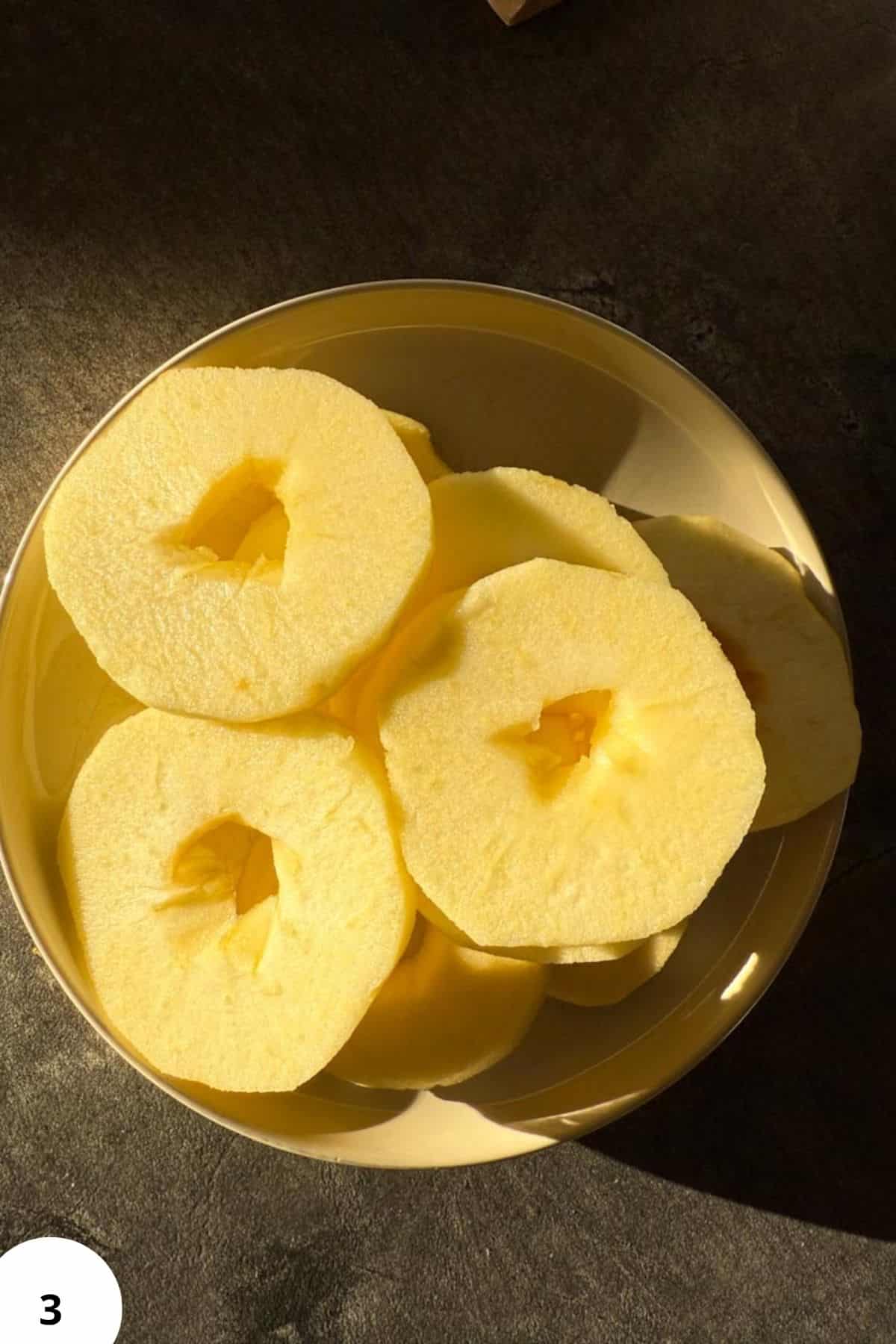 Fresh apple slices prepared for nutritious cooking and baking, emphasizing fresh milled ingredients for health-conscious recipes.