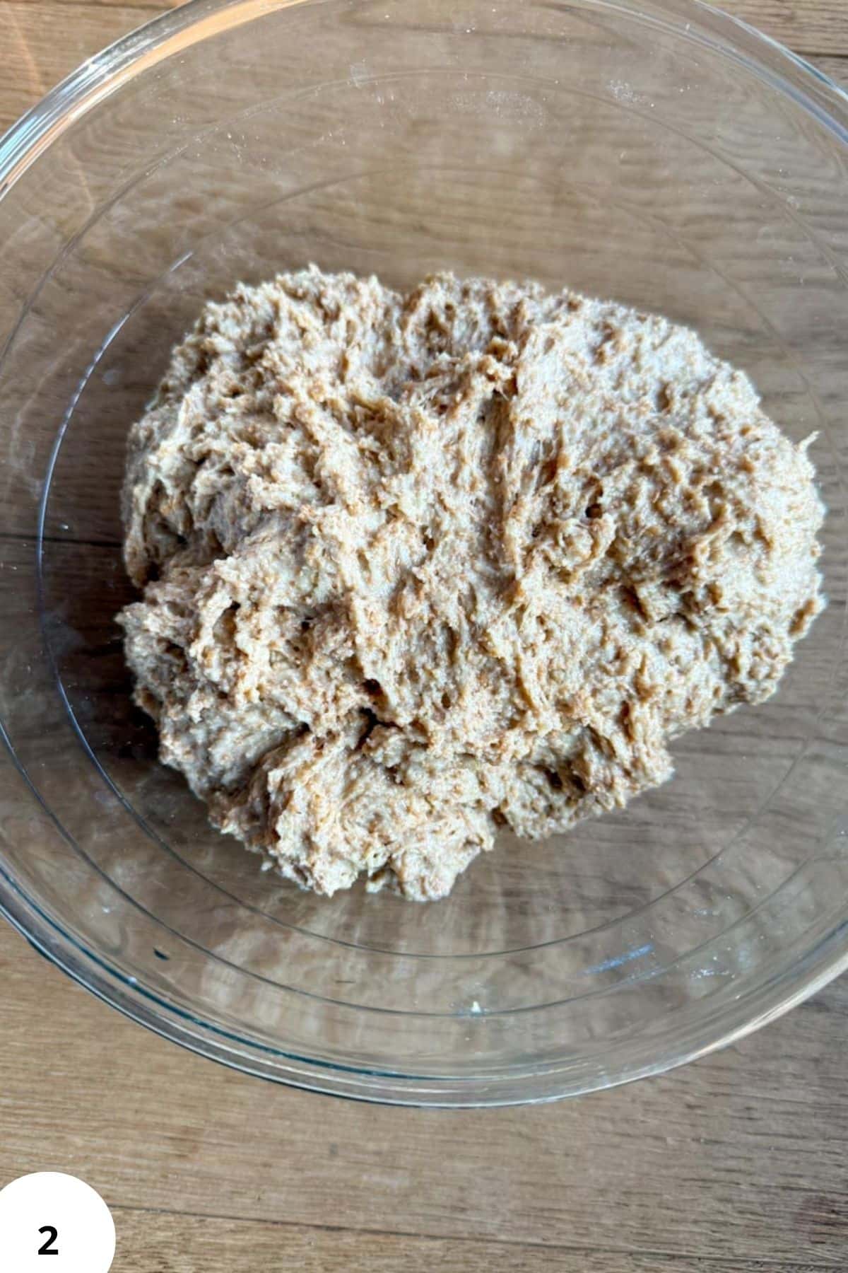 Fresh milled whole wheat flour in glass bowl for baking recipes.