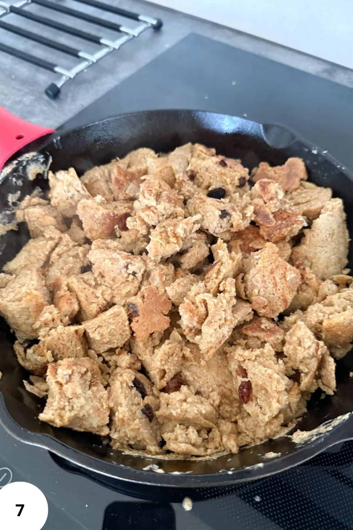 Close-up of cookie crumble in a skillet, highlighting fresh milled grains and homemade baking recipes.