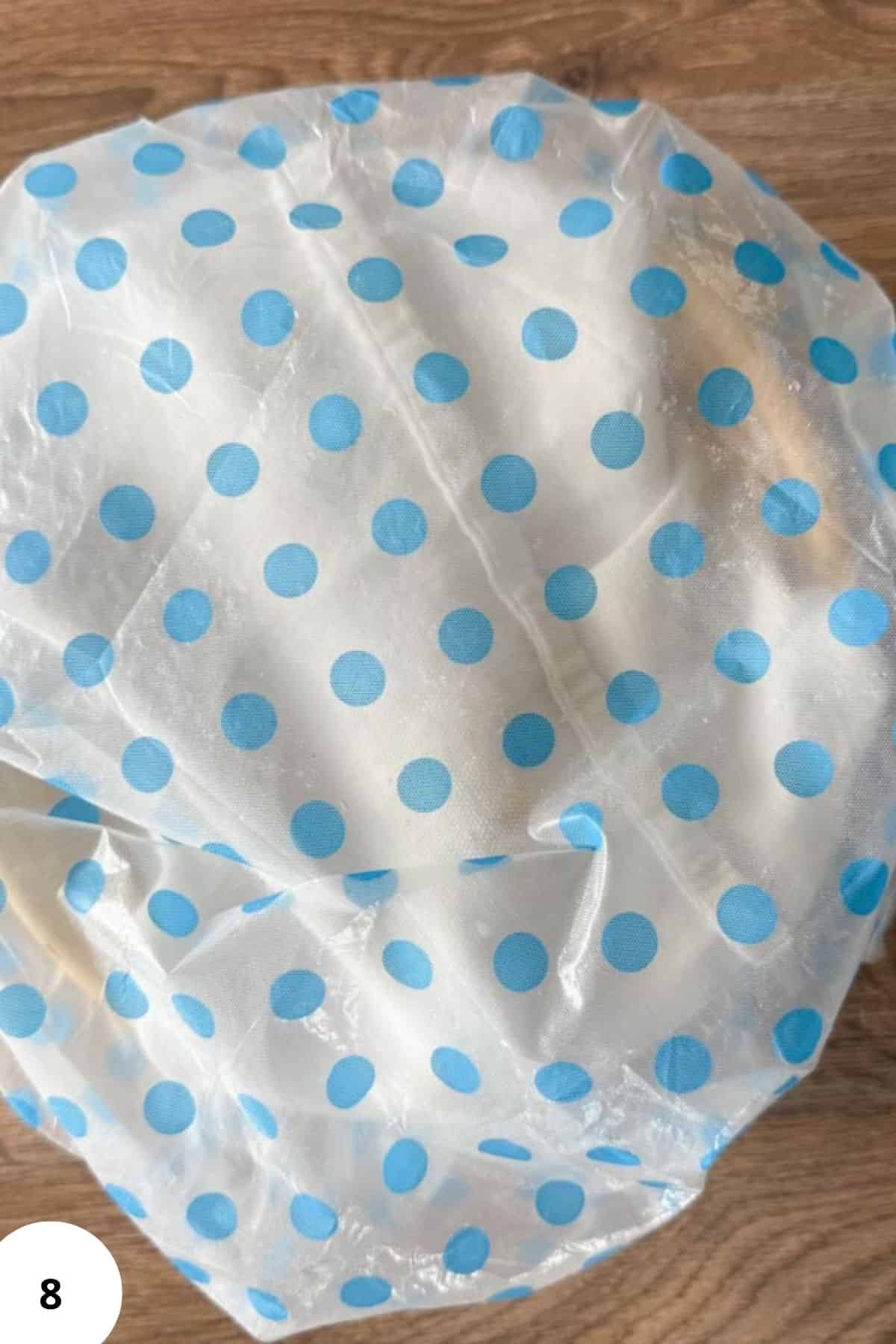 Food-safe parchment paper with blue polka dots for baking and wrapping.