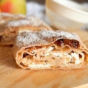 Delicious homemade apple cinnamon pastry made with fresh milled flour and dusted with powdered sugar. Perfect for breakfast or dessert.