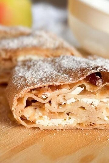 Delicious homemade apple cinnamon pastry made with fresh milled flour and dusted with powdered sugar. Perfect for breakfast or dessert.