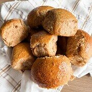 Golden homemade bread rolls perfect for snacks and meals. Soft, fluffy, and freshly baked with wholesome ingredients.