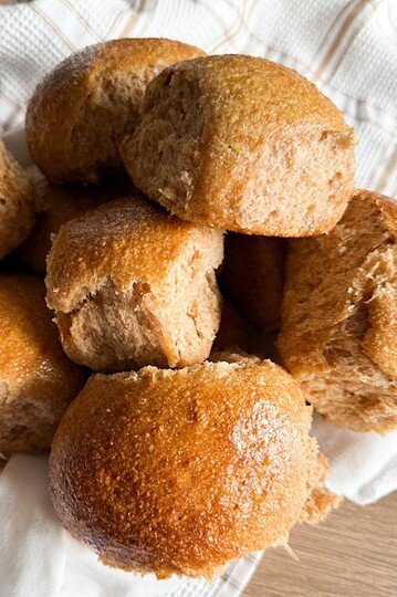 Golden homemade bread rolls perfect for snacks and meals. Soft, fluffy, and freshly baked with wholesome ingredients.