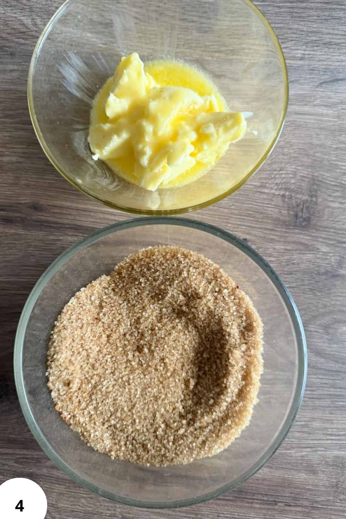 Creamy butter and ground graham flour in glass bowls for baking recipes.