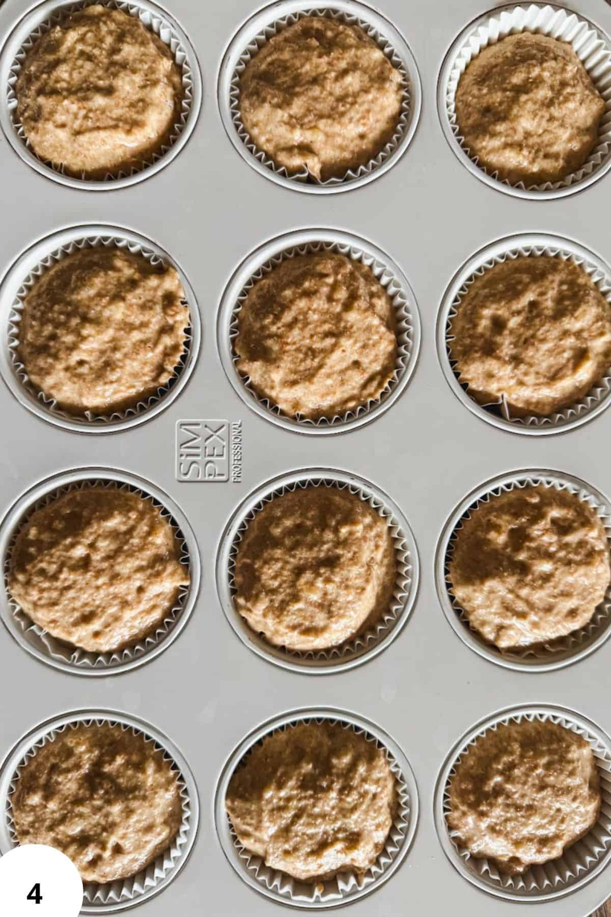 Fresh Milled Banana Muffins in a muffin tin, showcasing homemade, healthy baking with fresh ingredie.