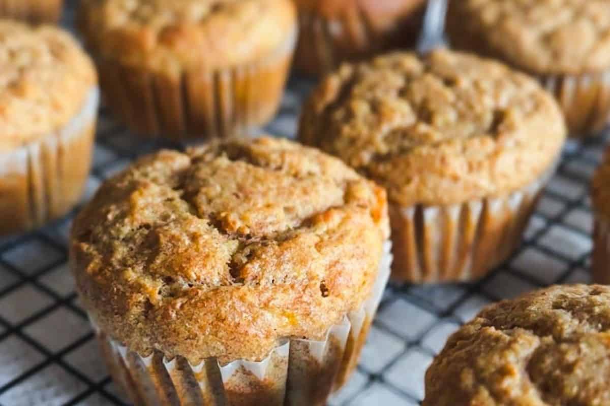 Delicious banana muffins made with fresh milled flour and applesauce, perfect for healthy breakfast.