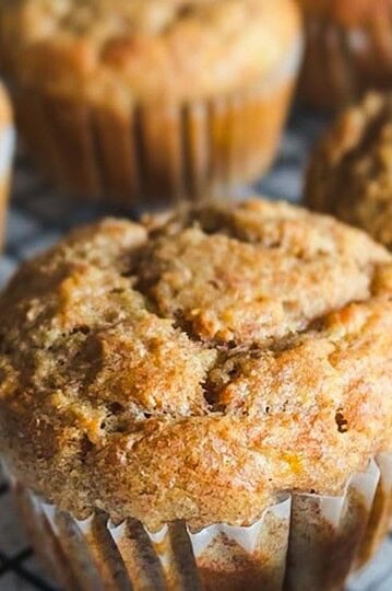 Delicious homemade banana muffins made with fresh milled flour and applesauce, perfect for breakfast.