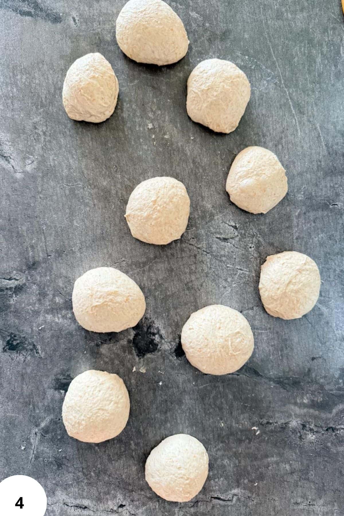 Bread rolls made with freshly milled spelt flour for sourdough baking.