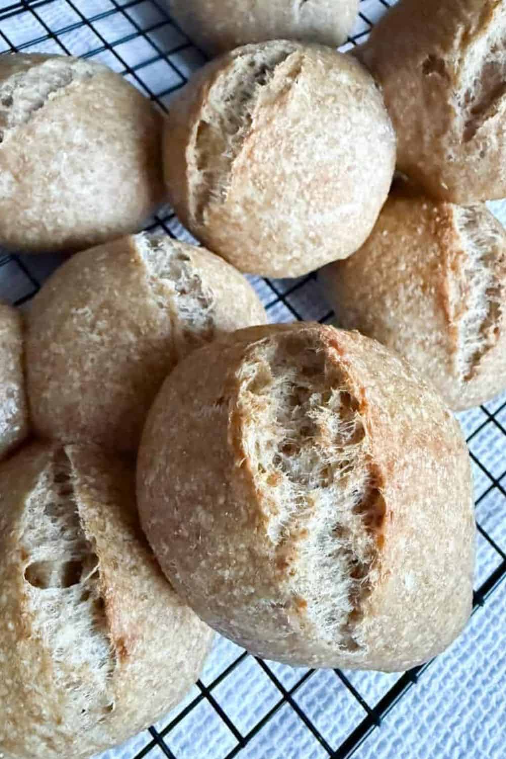 Freshly baked sourdough bread rolls made with freshly milled flour.