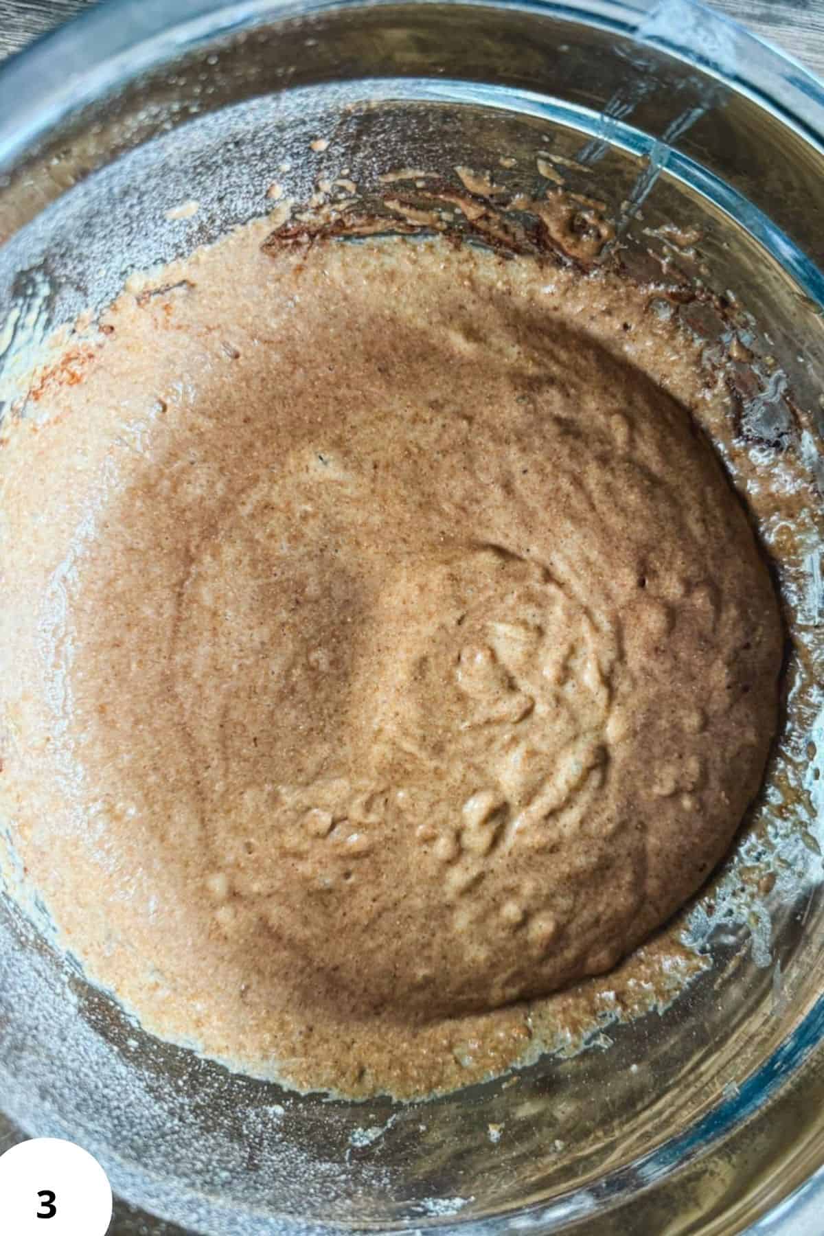 Close-up of freshly milled flour in a glass bowl for baking.