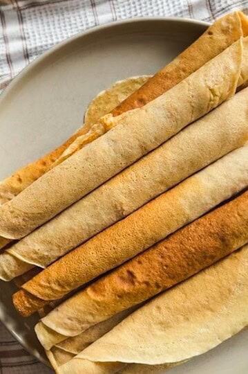 Delicious homemade palatschinken made with fresh milled flour, perfect for breakfast or dessert.