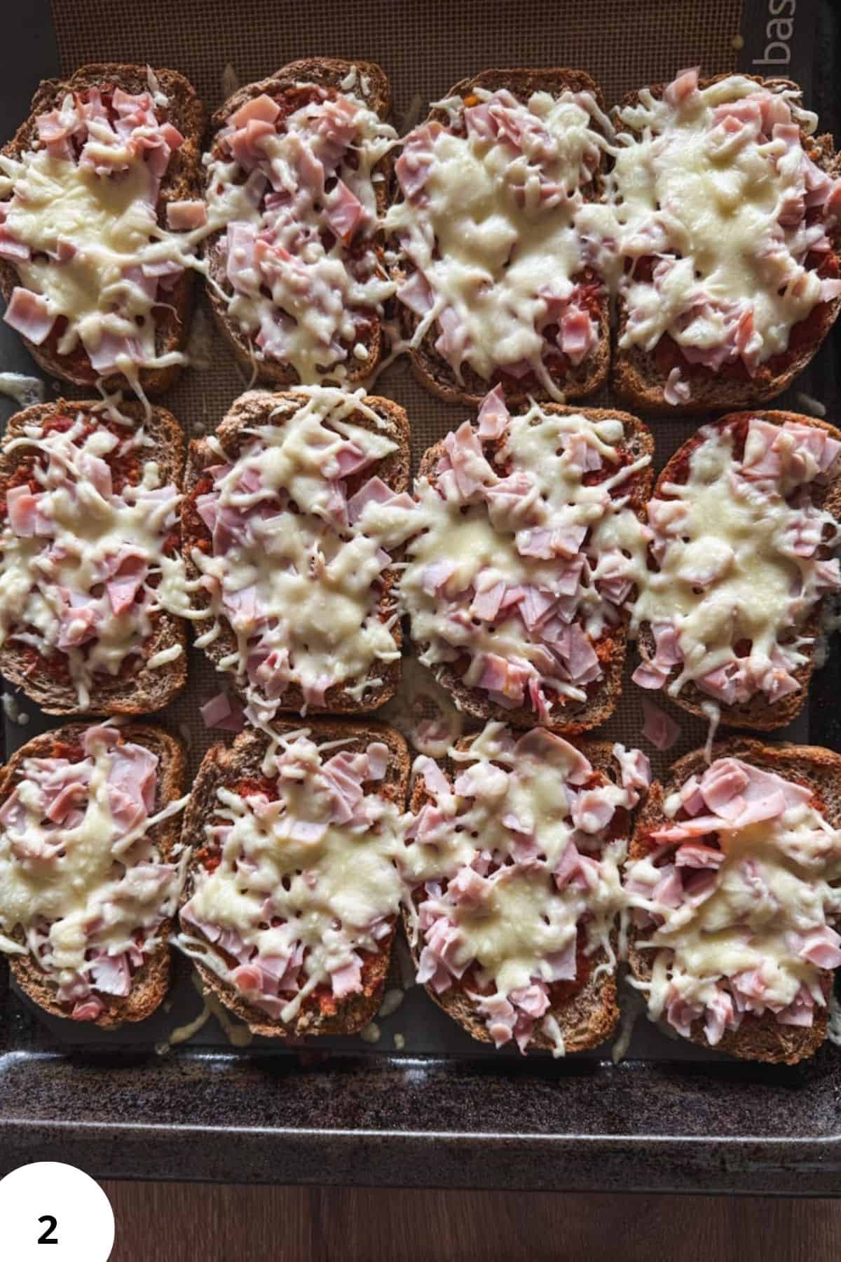 Delicious ham and cheese toasts topped with creamy cheese and ham pieces, perfect for breakfast or s.