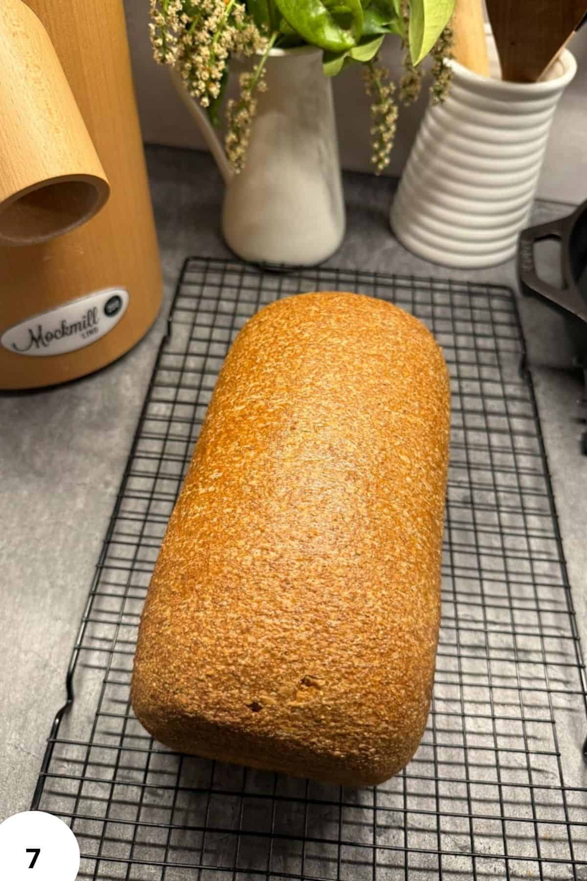 Freshly baked sourdough bread made with freshly milled grains, perfect for sandwiches and toast.