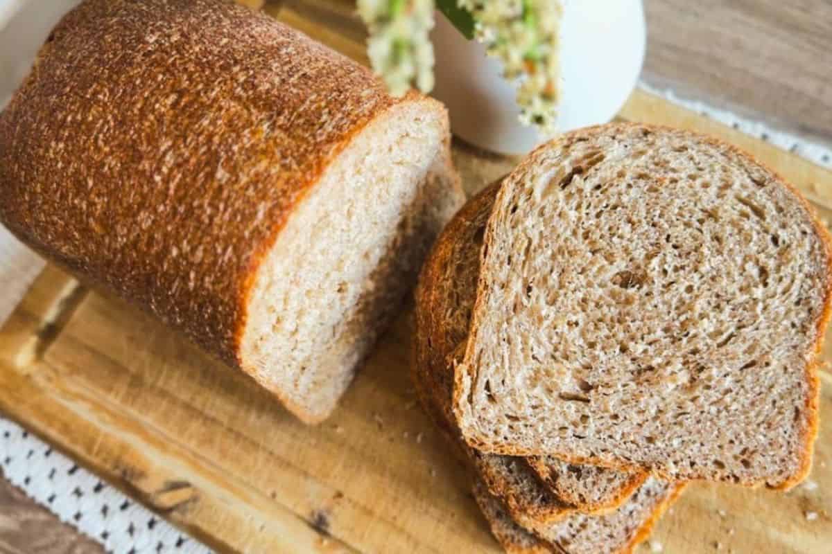 Freshly baked sourdough bread made with fresh-milled flour, perfect for sandwiches and toast.