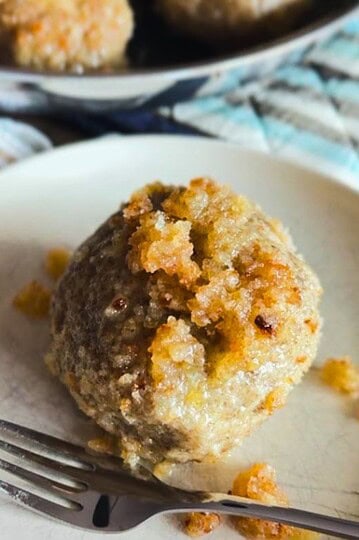 Freshly baked dessert featuring a crumbly topping and a soft, moist interior, perfect for healthy ea.