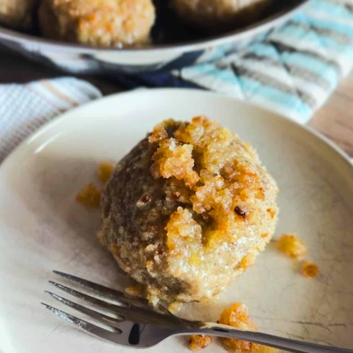 Freshly baked dessert featuring a crumbly topping and a soft, moist interior, perfect for healthy ea.