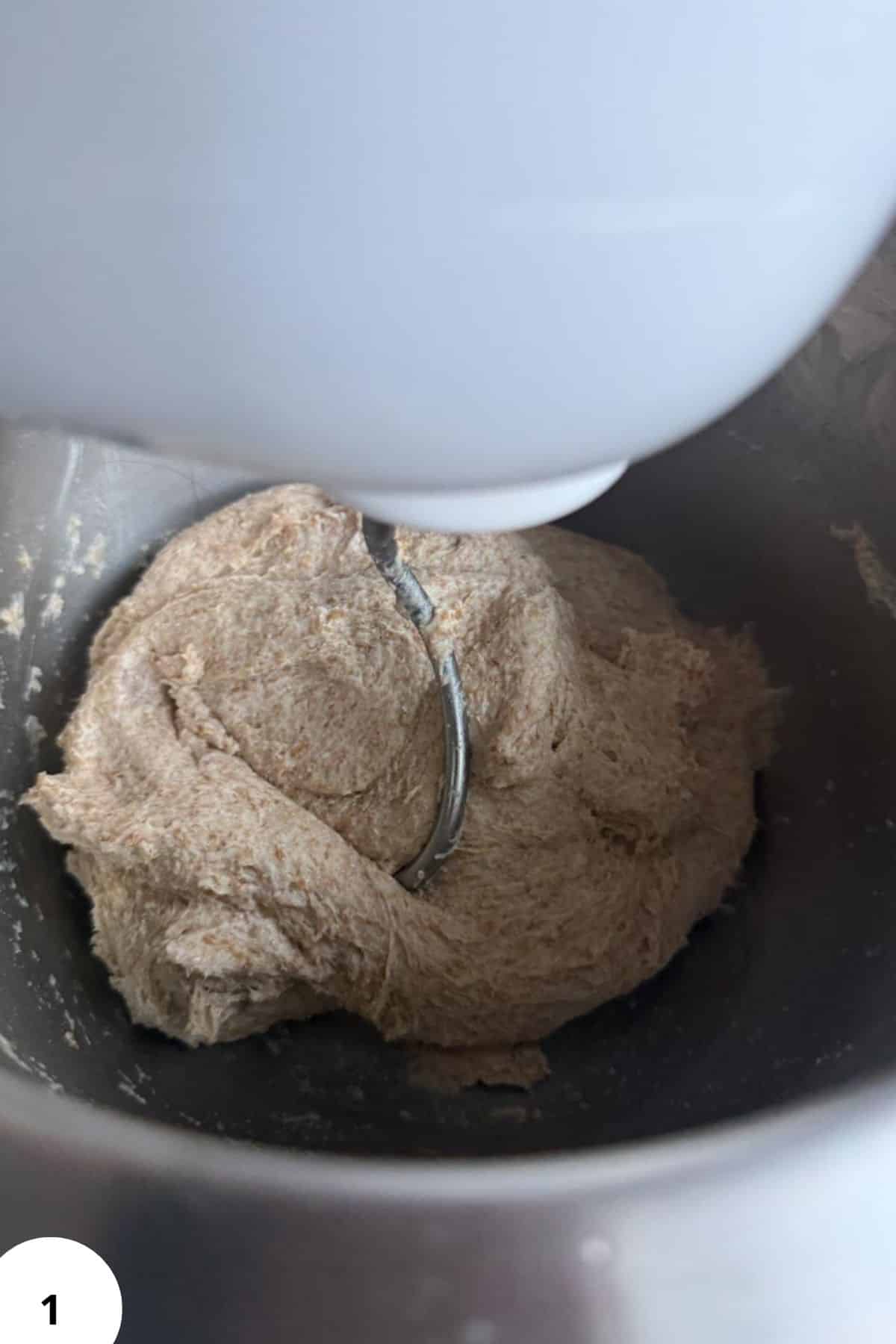 Freshly milled whole grain dough in a mixer for healthy baking recipes.