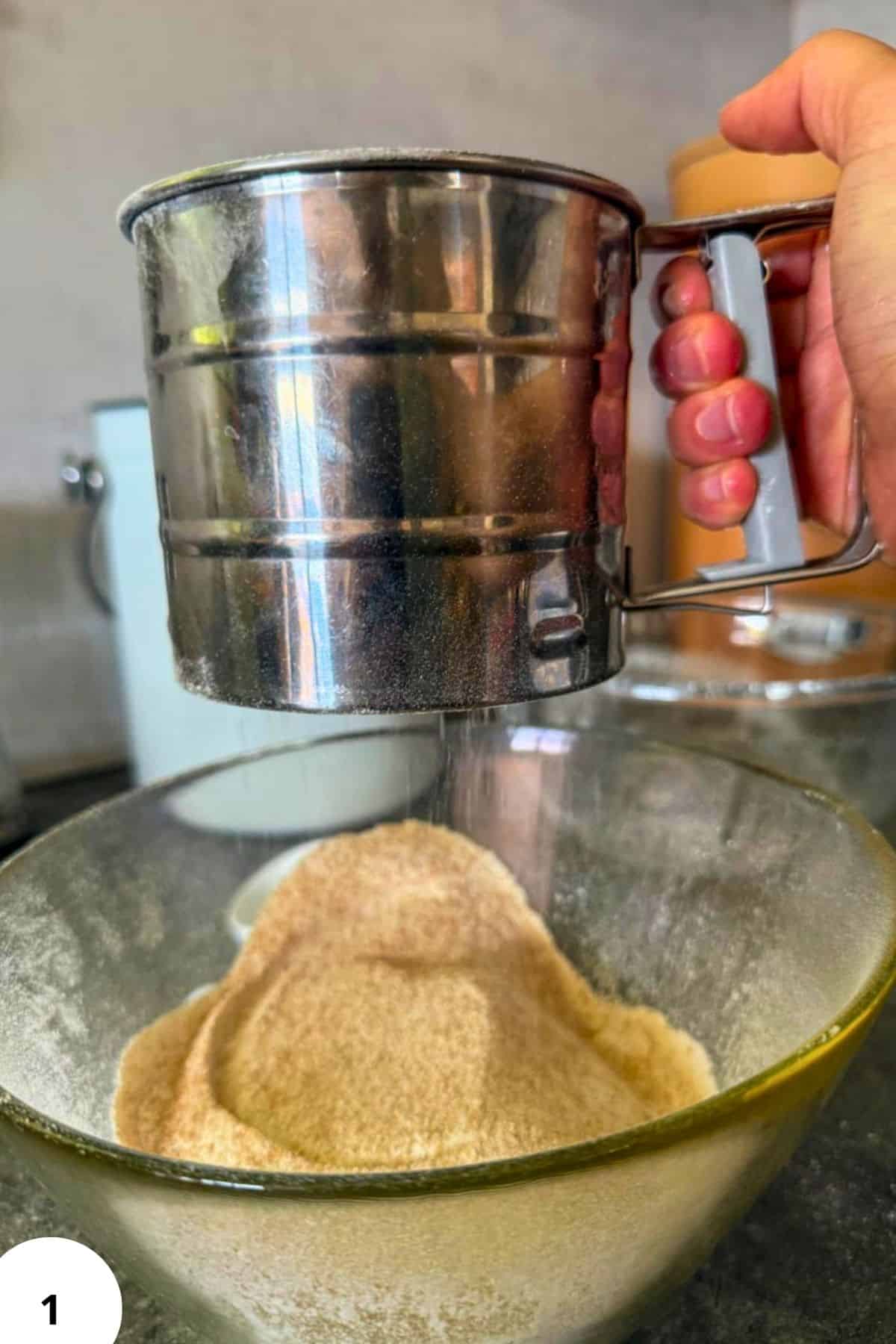 Milling fresh ground flour for cherry strudel baking process.