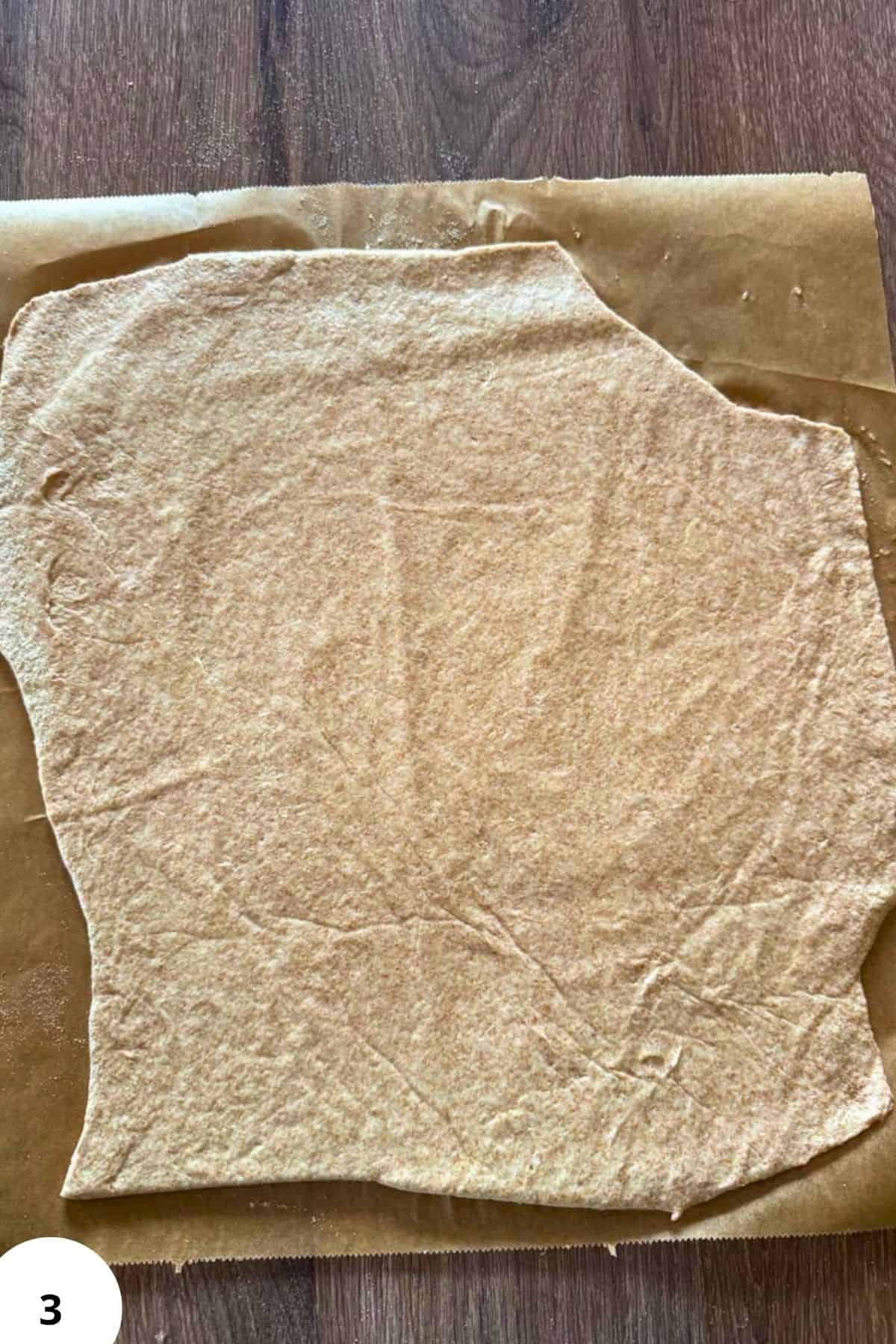 Freshly milled flour on parchment paper for baking and cooking.