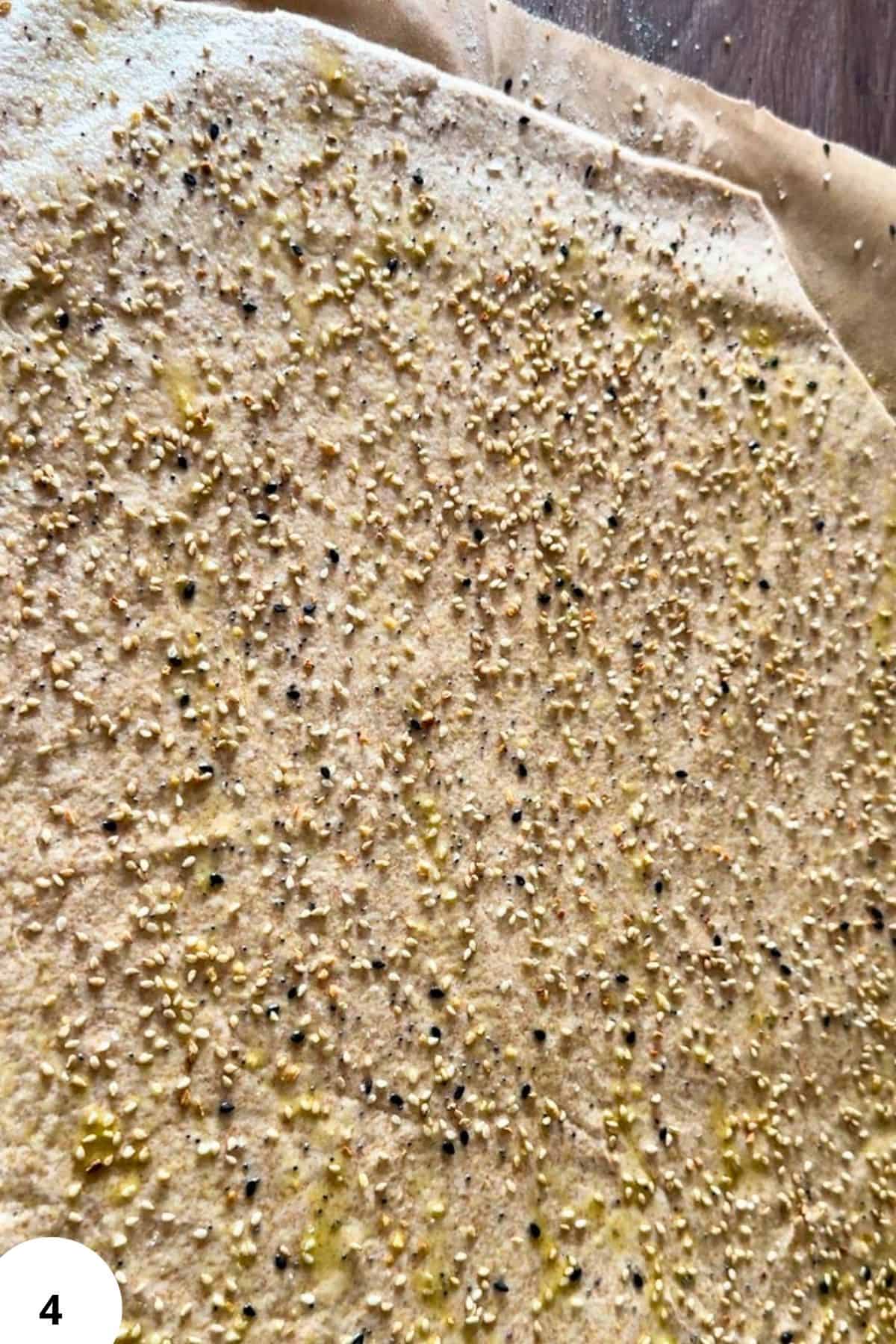 Freshly milled grain dough with seeds, ready for baking or cooking.