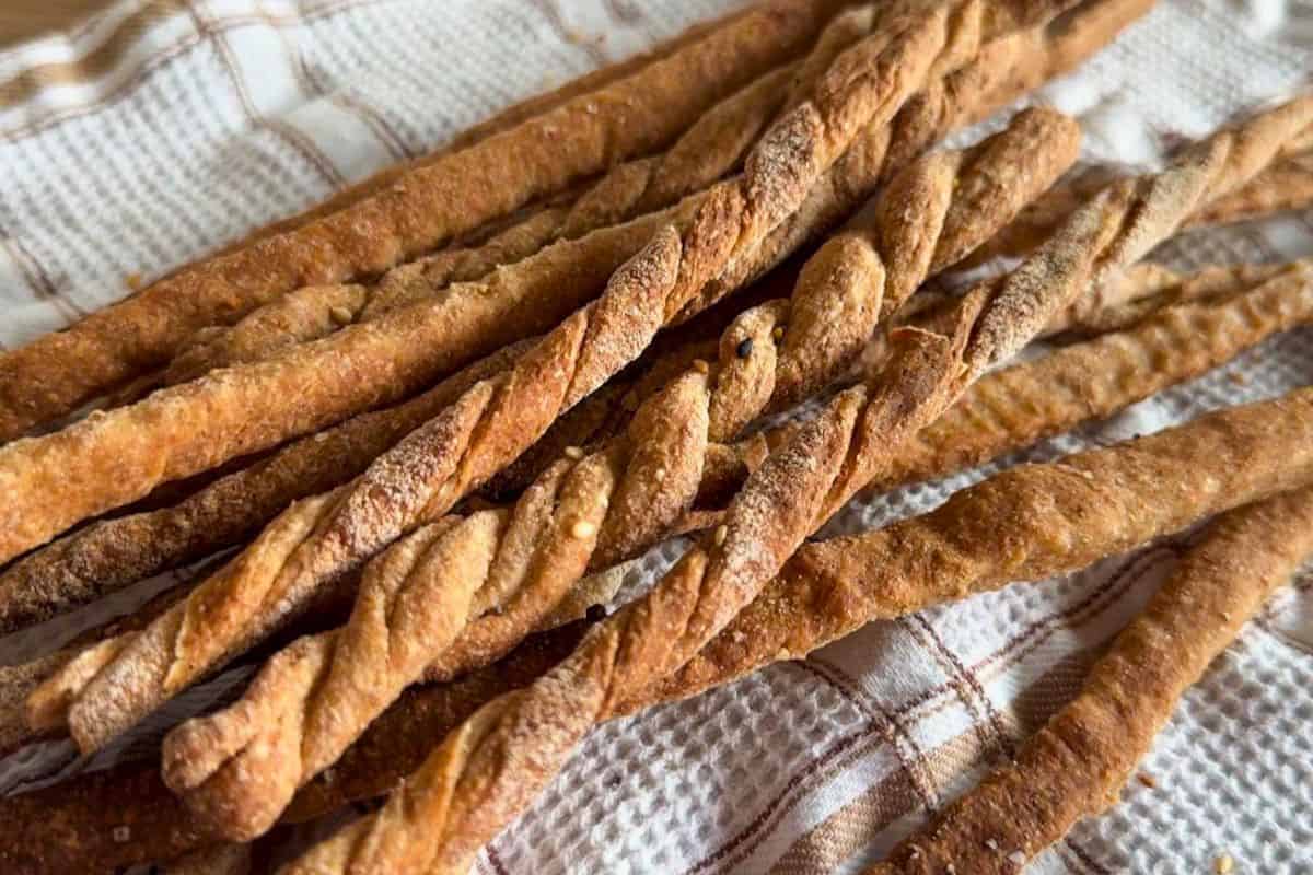 Freshly baked whole grain breadsticks made from milled grains, crispy and flavorful.