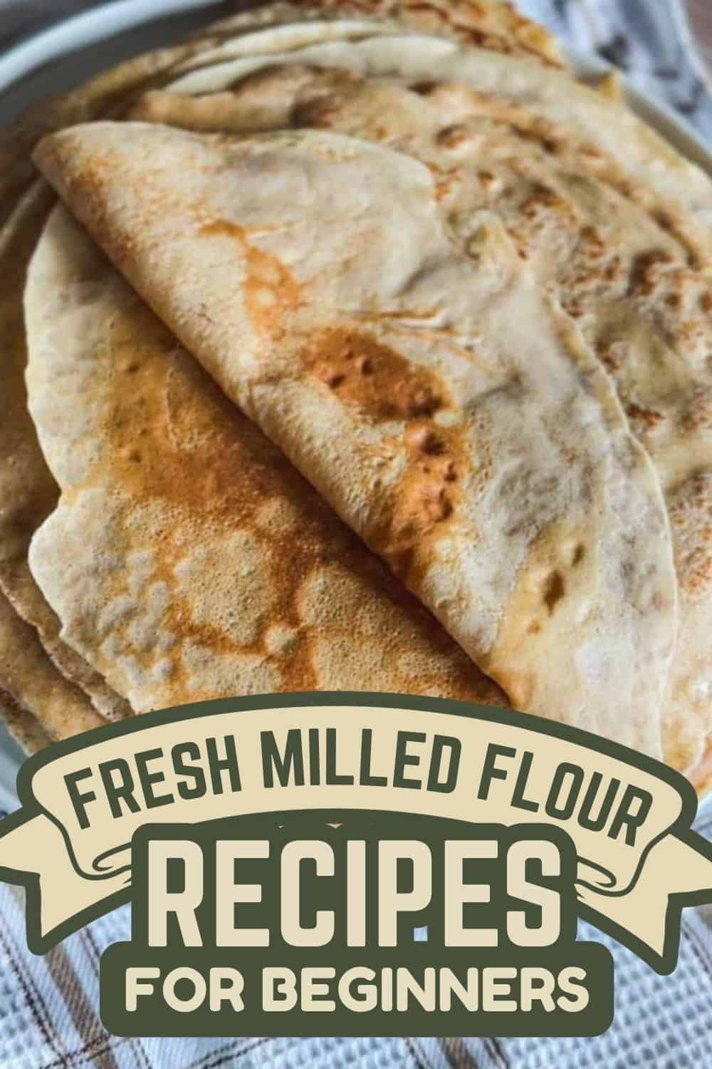 Close-up of freshly made flour tortillas on a baking sheet.