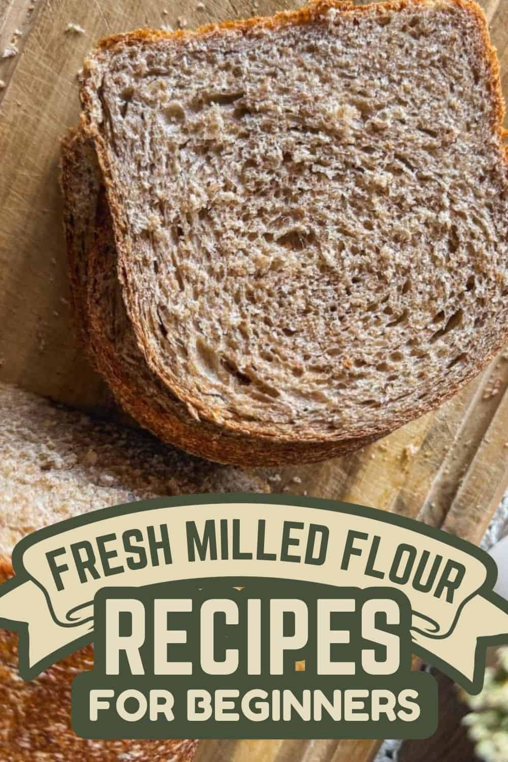 Close-up of a slice of fresh milled flour bread on a wooden surface.