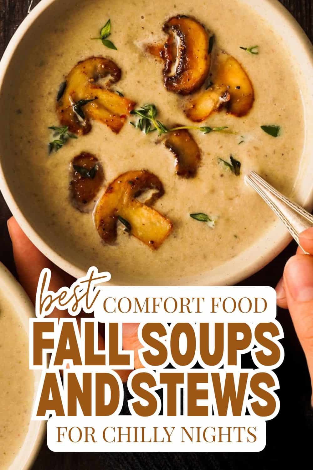 Creamy fall soup with roasted squash and herbs in a bowl.