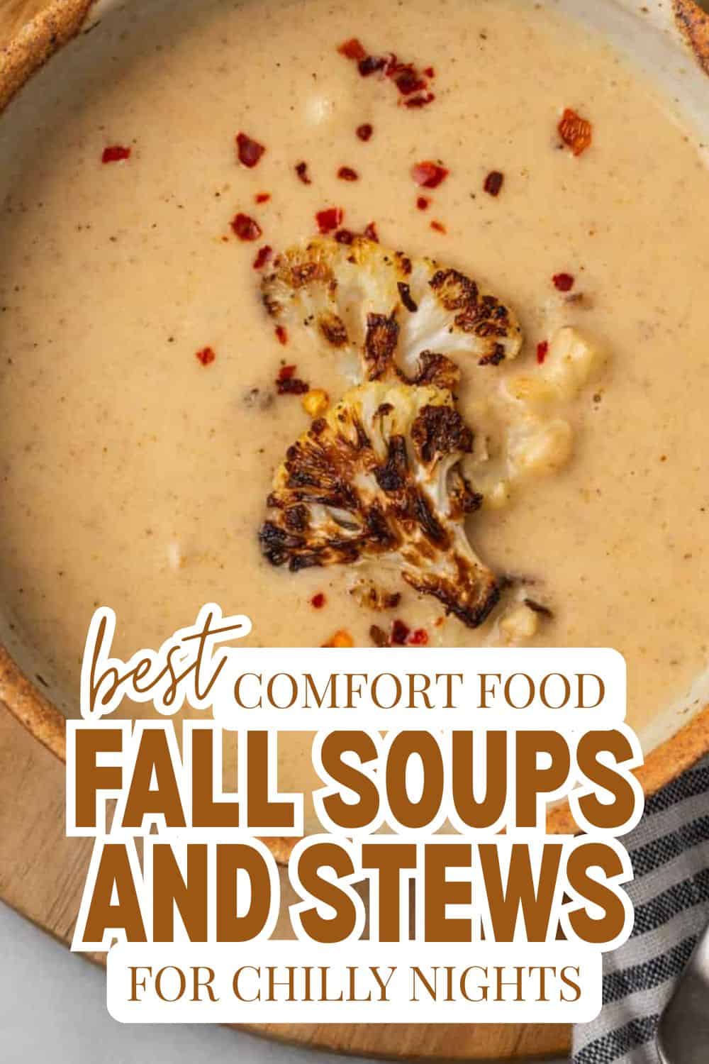 Creamy cauliflower soup topped with red pepper flakes and roasted cauliflower florets.