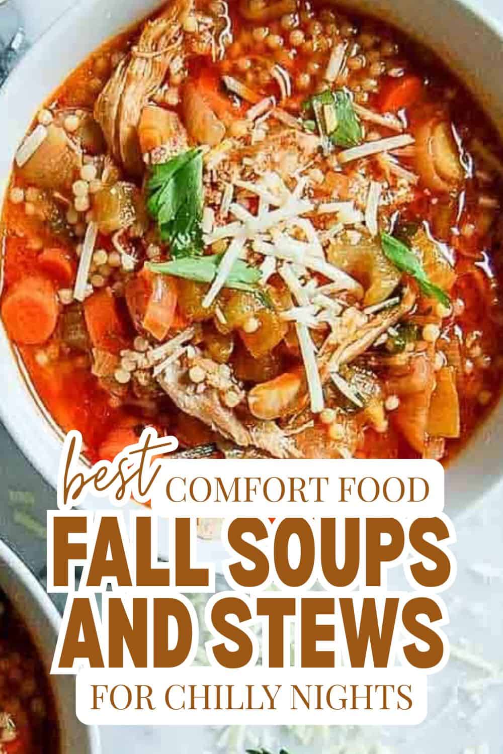 Hearty bowl of fall soups and stews with vegetables and shredded cheese.