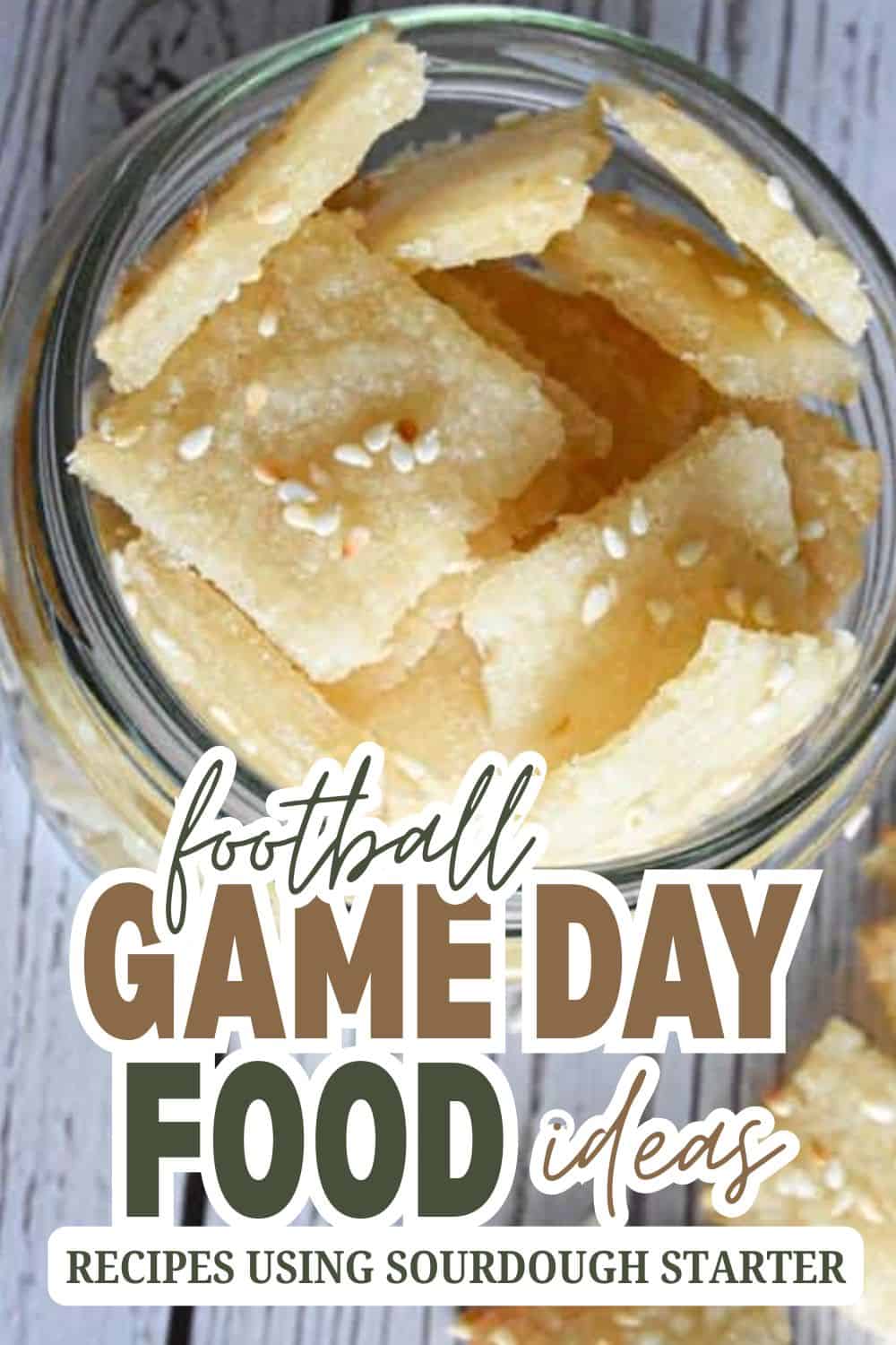 Delicious homemade sourdough crackers in a glass jar for game day snacks.
